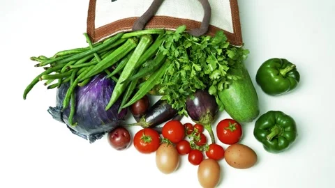 Fresh Vegetables and Eggs from Grocery Bag, A variety of fresh vegetables a.. Vídeos de archivo 305046419