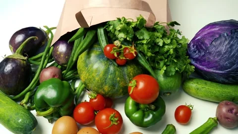 Fresh Vegetables and Eggs Spilling from Paper Bag, A variety of fresh veget.. 스톡 동영상 305053756