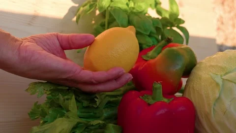 Fresh vegetables and hand Stock Footage 319315659