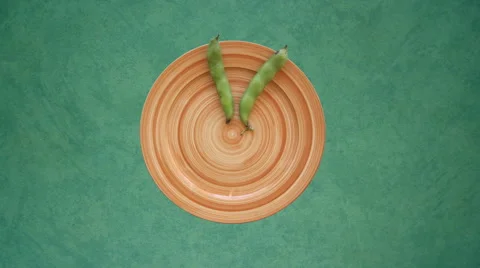 Fresh Vegetables appears on a Plate stop motion animation Video stock 68562971