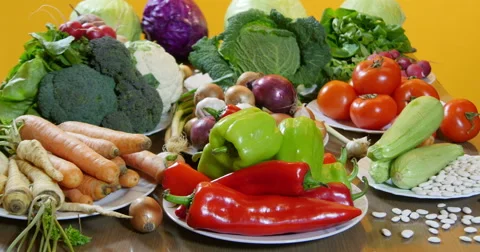 Fresh vegetables arranged in plate on table, vegan food, dolly shot. Stock Footage 60600038