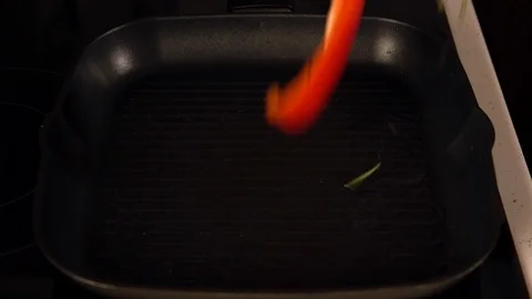 Fresh vegetables being added to a grill pan Video stock 105120548