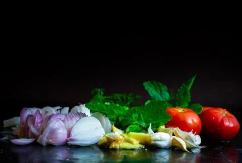 Fresh vegetables on a black table Stock Photos
