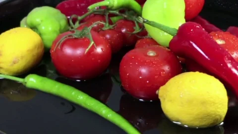 Fresh vegetables close up dolly shoot black background Stock-Footage 75291404