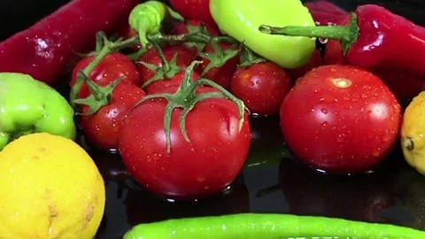 Fresh vegetables close up dolly shoot black background Stock-Footage 75291457