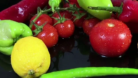 Fresh vegetables close up dolly shoot black background Video stock 75291479