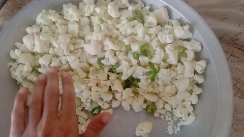 Fresh Vegetables Cut by Hand During Traditional Food Preparation Stock Footage 346877056