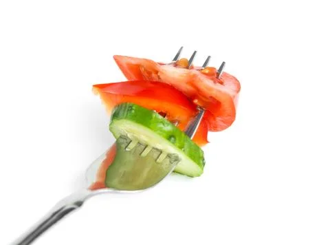 Fresh vegetables on fork Foto stock