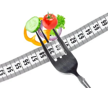 Fresh vegetables on fork Stock Photos
