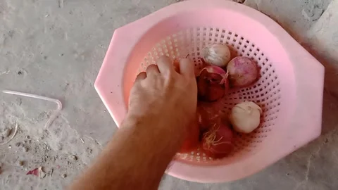 Fresh Vegetables Held in a Hand During Kitchen Preparation 스톡 동영상 346877227