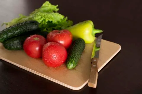 Fresh vegetables on a kitchen table Stock Photos