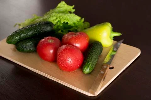 Fresh vegetables on a kitchen table Stock Photos