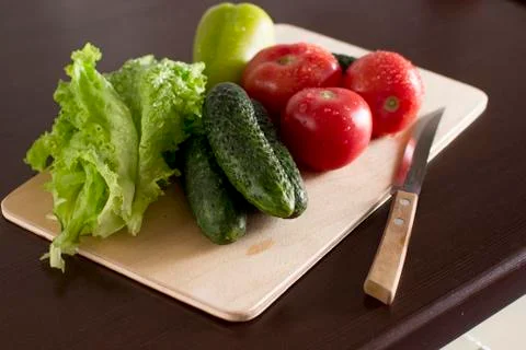 Fresh vegetables on a kitchen table Stock Photos