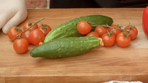 Fresh vegetables in kitchen on wooden table Stock-Footage 74933181