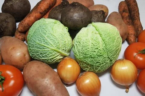 Fresh vegetables potatoes, cabbage, beets, carrots, onions, tomatoes are pack Stock Photos