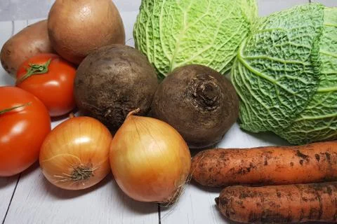 Fresh vegetables potatoes, cabbage, beets, carrots, onions, tomatoes are pack Stock Photos