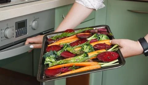 Fresh vegetables for roasting on baking tray Stock Photos