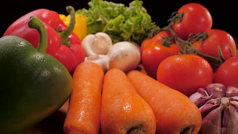 Fresh vegetables on rustic wooden table Stock Footage 149698103
