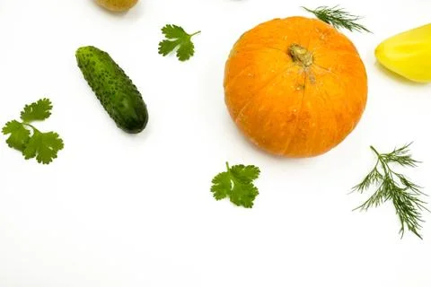 Fresh vegetables on a white background, flat lay: Potatoes, pumpkin, dill, cu Stock Photos