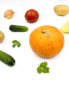 Fresh vegetables on a white background, flat lay: Potatoes, pumpkin, dill, to Stock Photos