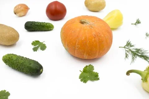 Fresh vegetables on a white background, flat lay: Potatoes, pumpkin, dill, to Stock Photos