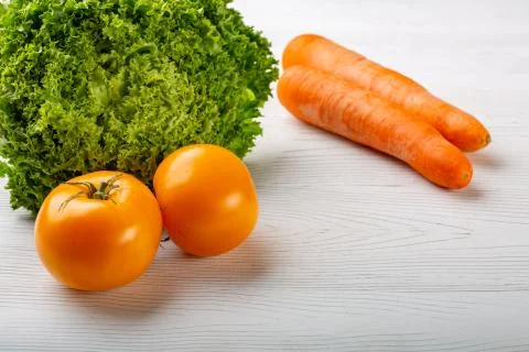 Fresh vegetables on a white background. Stock Photos