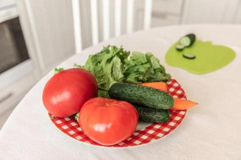 Fresh vegetables on the white background. Stock Photos