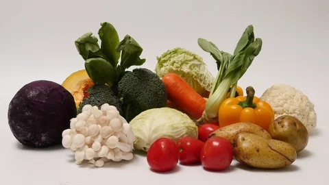 Fresh vegetables on a white background. Stop motion animation loop Stock Footage 98915425