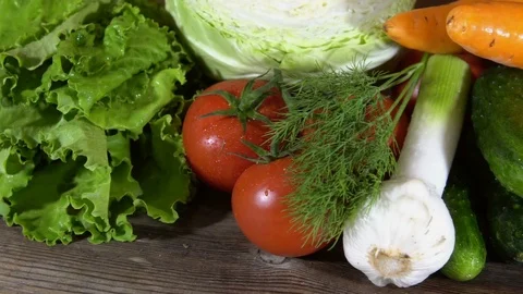 Fresh vegetables on a wooden table Video stock 77203278