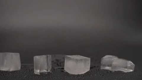 Fresh verdure salad falling down on wet dark surface. Lettuce leafs. Stock Footage 125486992