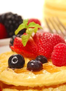 Fresh waffles with fruit Stock Photos