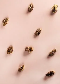 Fresh walnuts slice pattern on colorful background Stock Photos