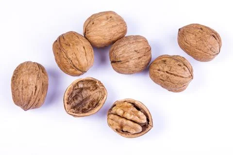 Fresh walnuts on a table. Stock Photos