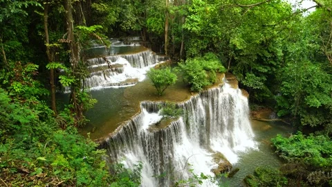 Fresh water falling at wild jungle waterfalls Stock Footage 233144986