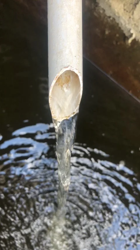 Fresh water flows from the filter pipe Stock Footage 320064113