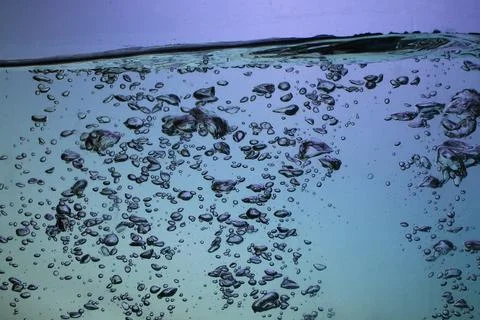 Fresh water with underwater bubbles texture background Stock Photos