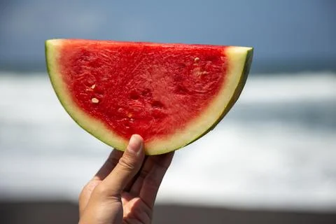 Fresh watermelon slice at the beach Stock Photos