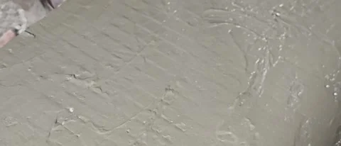 Fresh Wet Cement Slurry Surface with Combed Texture Stock Footage 341716128