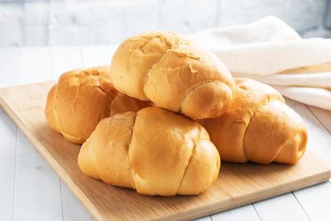 Fresh wheat bread rolls. Rolls for a hot dog or hamburger. White background.. Foto stock