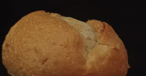 Fresh white bread buns close up. Black background. 動画素材 234541669