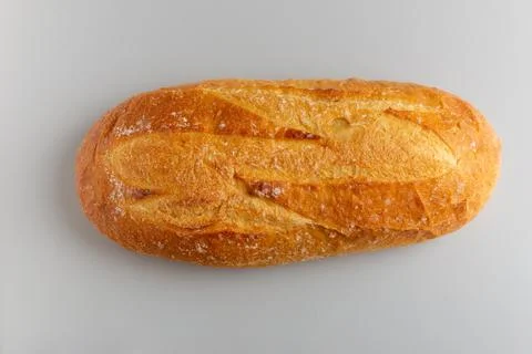 Fresh white bread on white background top view Stock Photos