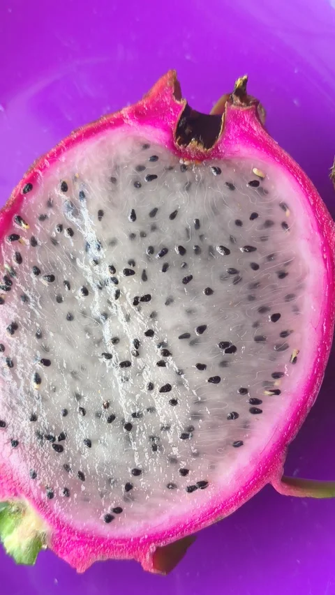 Fresh White Dragon Fruit  Half on Purple Plate.Healthy Vegan Lifestyle. Stock Footage 335536167