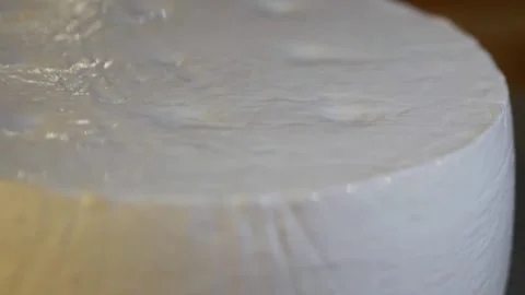 Fresh white round wheel of organic goat cheese from homemade farm from Swiss Stock Footage 222208490