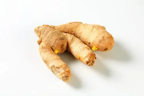 Fresh whole ginger root with visible buds Stock Photos