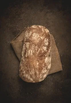 Fresh whole grain bread, rye, top view, without people 스톡 사진