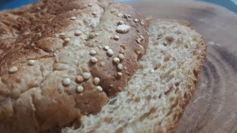 Fresh whole grain bread slice video showing natural healthy texture Stock Footage 339249043