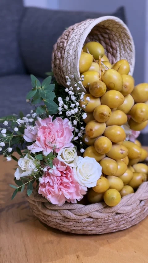 Fresh Yellow Dates And Flowers In Woven Basket Stock Footage 344548897