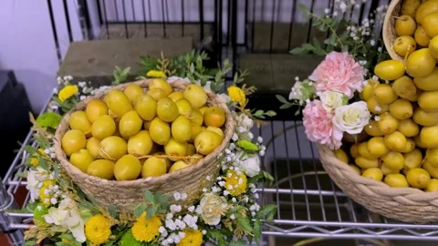 Fresh Yellow Dates Display With Floral Arrangement Stock Footage 344548626