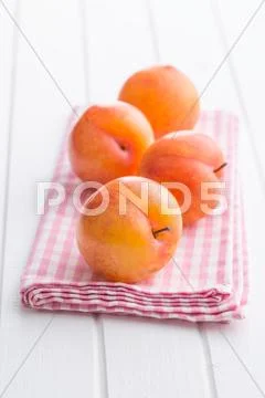Fresh yellow plums. Stock Photos