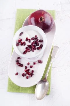 Fresh yogurt with pomegranate seed Stock Photos